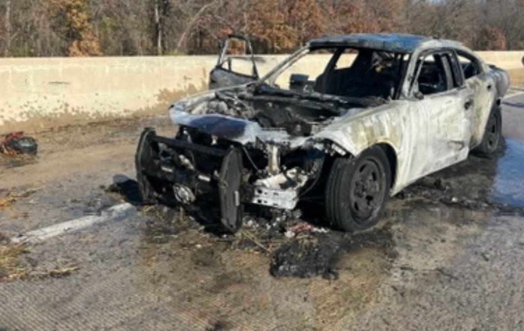 Heavily burned sedan